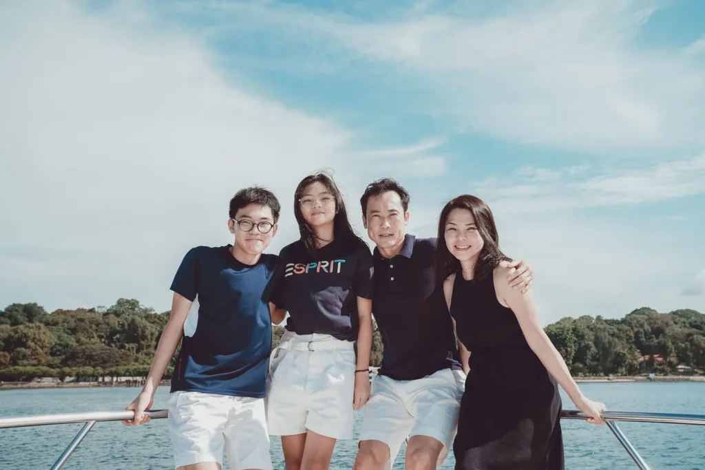 Family on the bow of a Sea Friends yacht charter