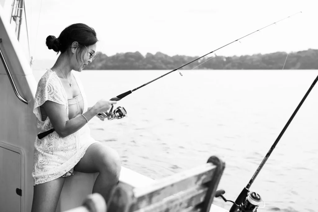 Fishing off the side deck of a Sea Friends charter yacht
