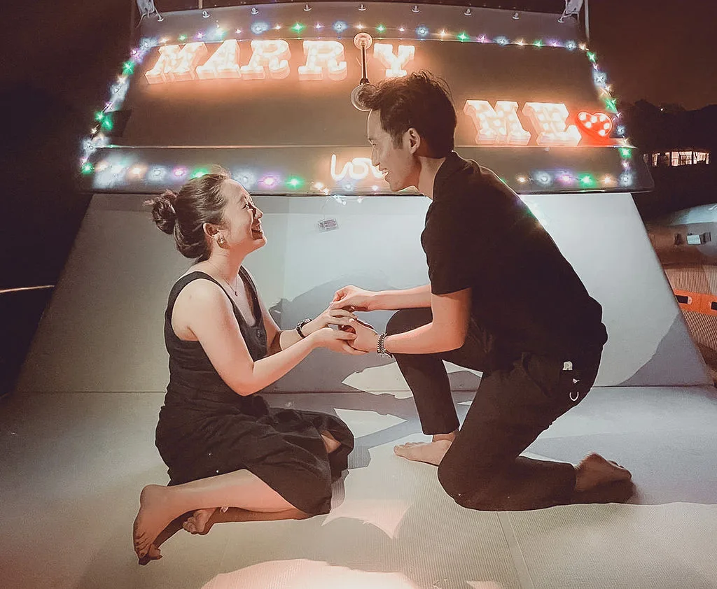 Proposal on one knee aboard a Sea Friends yacht