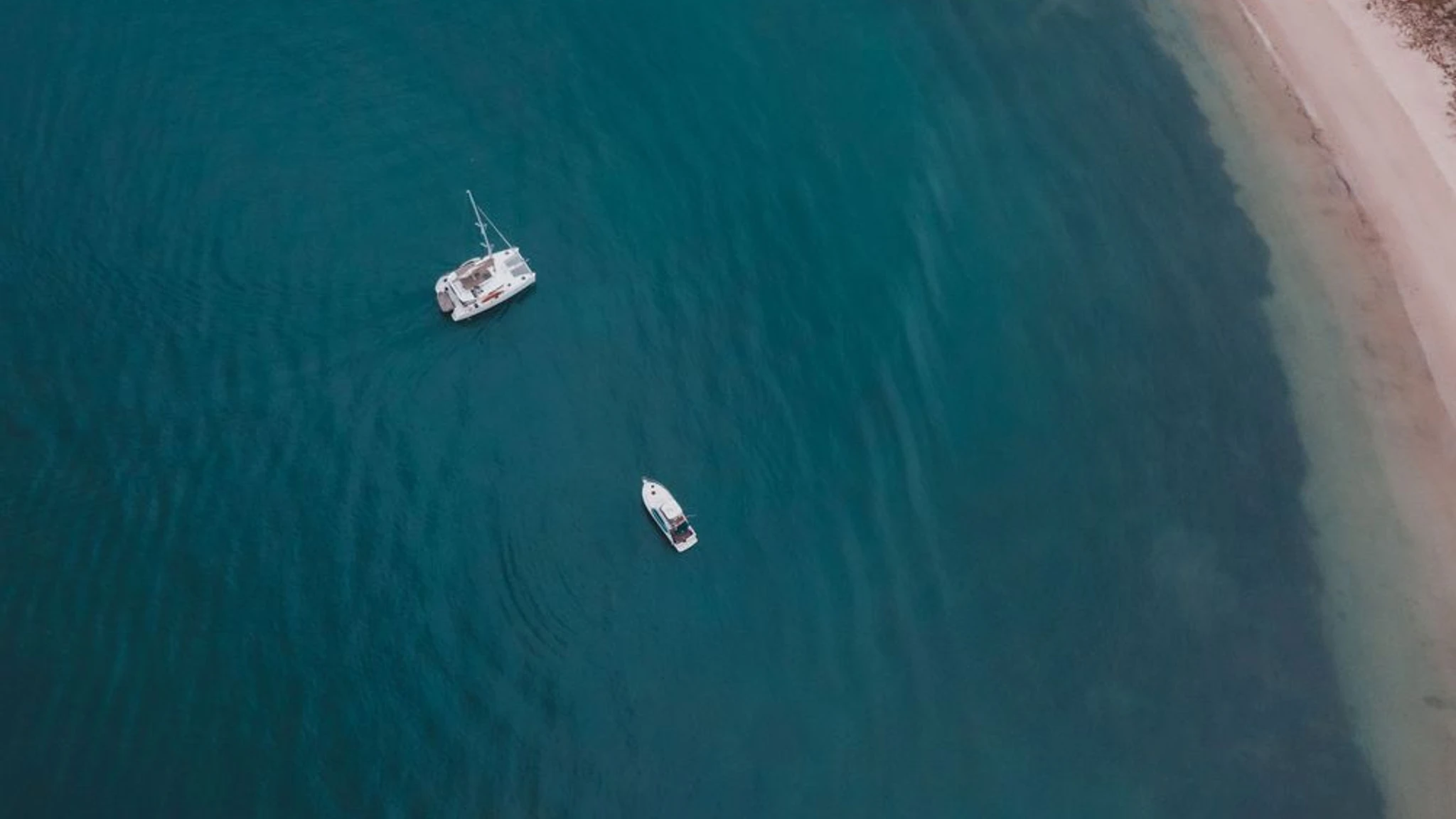 Corporate yacht offsite Singapore group on deck near southern islands